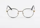 Retro Round Dual-Tone Frames in Polished Gold & Onyx Black